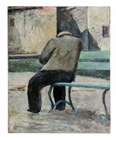 Uomo seduto di spalle.